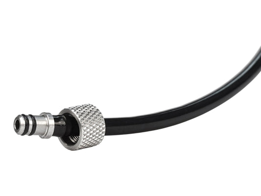 Close-up of the Wolverine WRAITH X AEG airline showing the knurled silver quick-connect fitting and the ribbed plug end