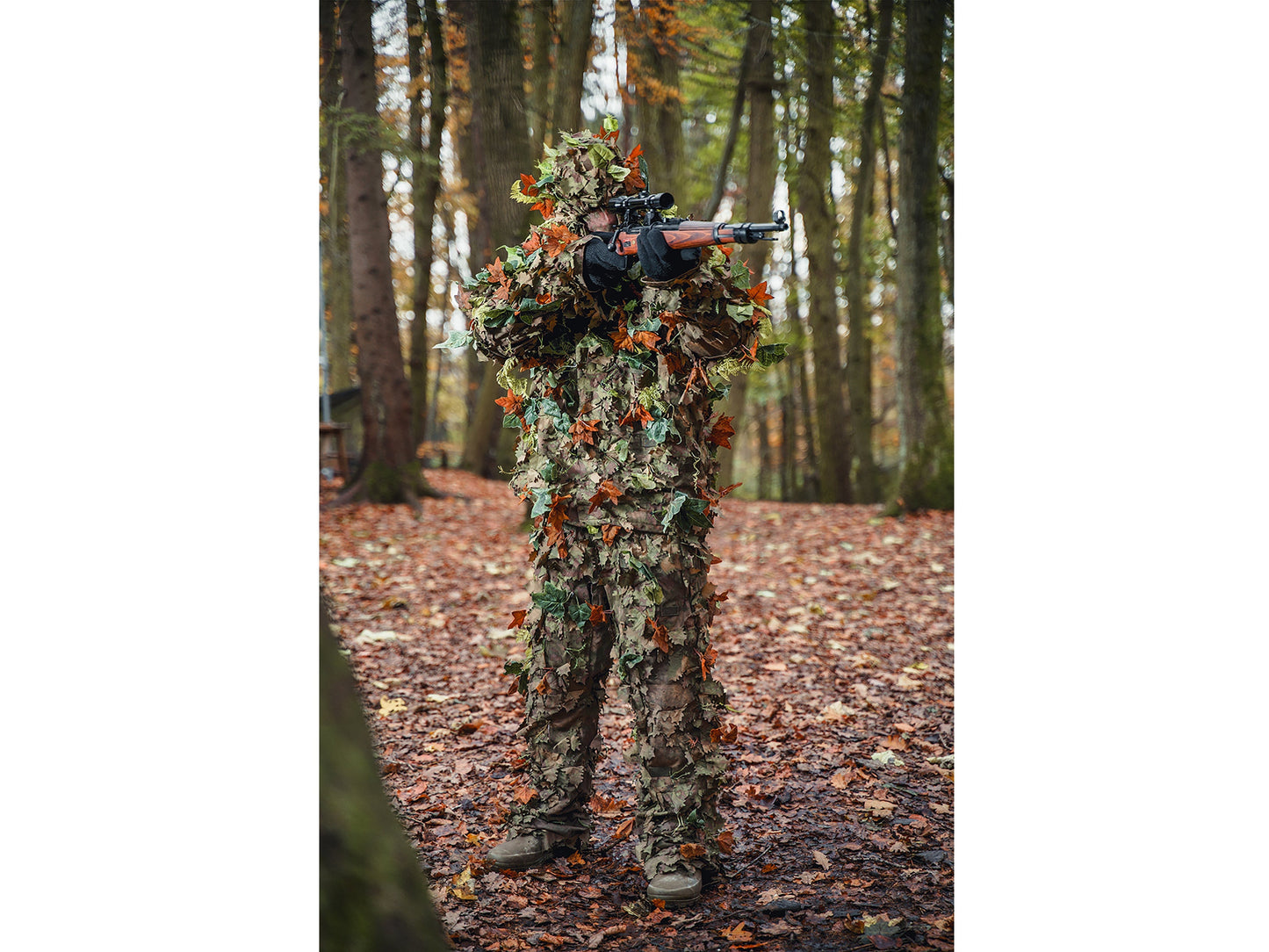 Airsoft Player in Ghillie Suit Aims Kar98k Sniper Rifle