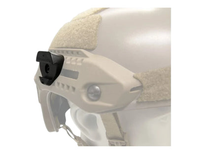 Black M13 M-LOK adapter block fitted to the side rail of a tan bump helmet, close-up