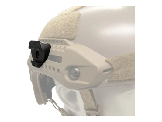 Black M13 M-LOK adapter block fitted to the side rail of a tan bump helmet, close-up