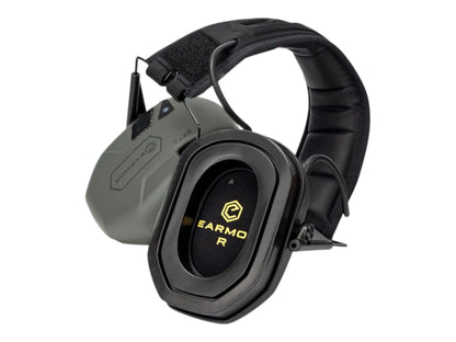 Green Earmor M300T earmuffs folded, showing the right cup with the gold Earmor logo