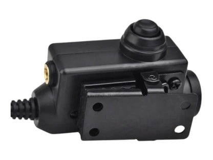 Earmor M51 PTT body at an angle showing the domed press button and mounting plate