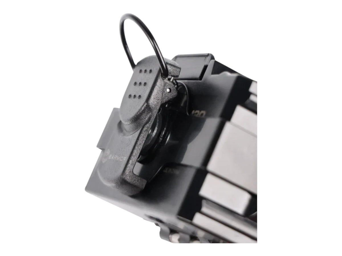 Earmor S25 battery holder fitted over a headset battery compartment, viewed from above