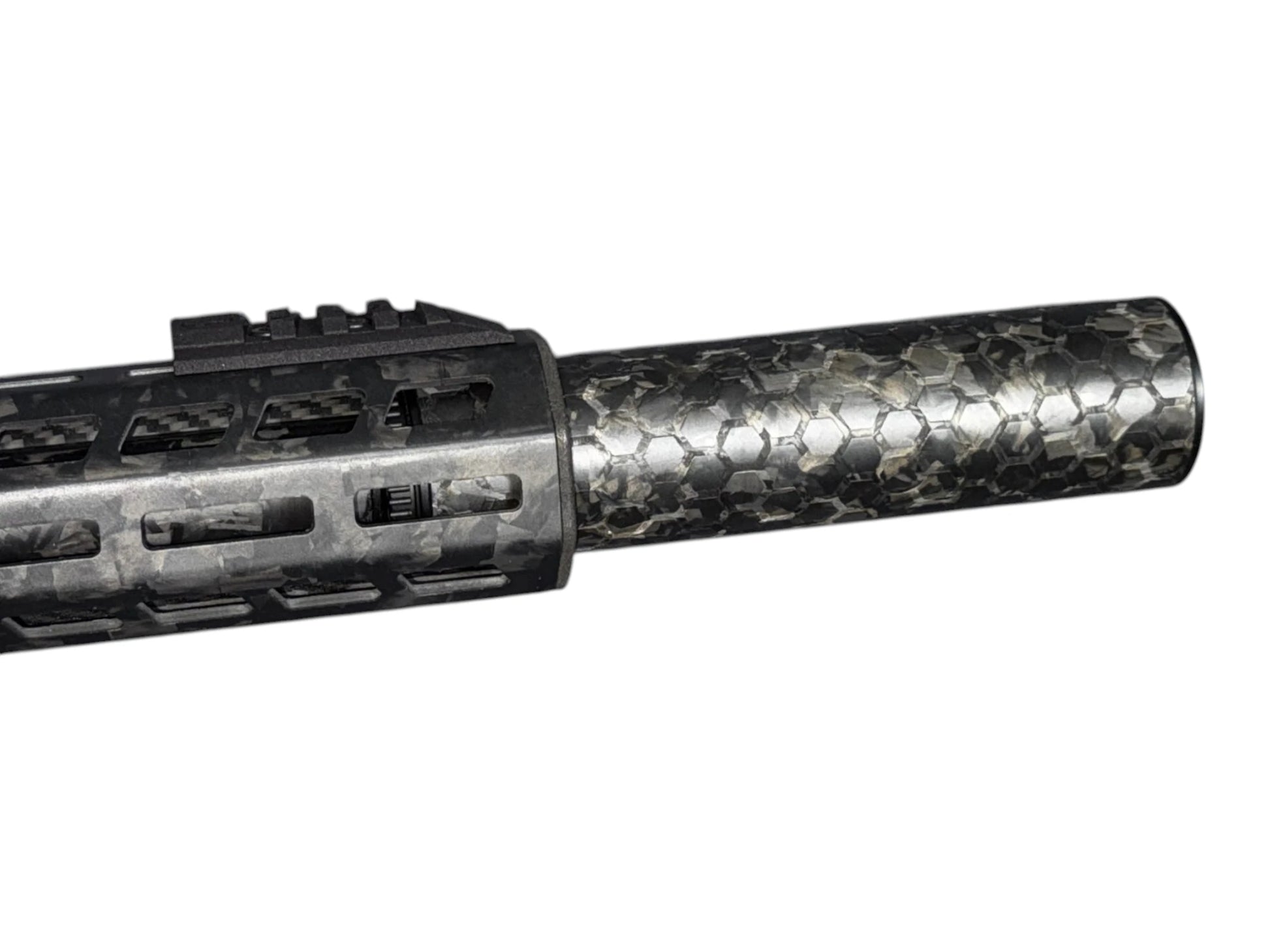 Image 2: Strike Carbon HEX 40 6 inch suppressor showing forged carbon marbling and hex engraving
