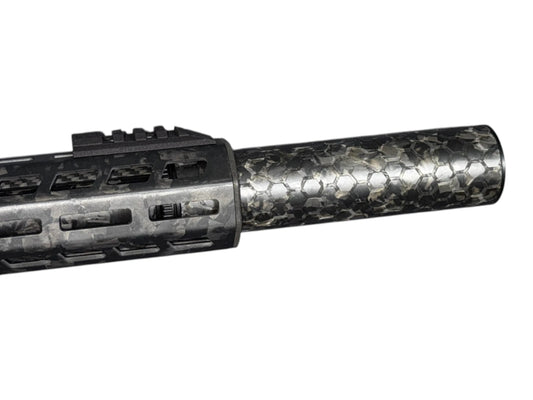 Image 2: Strike Carbon HEX 40 6 inch suppressor showing forged carbon marbling and hex engraving
