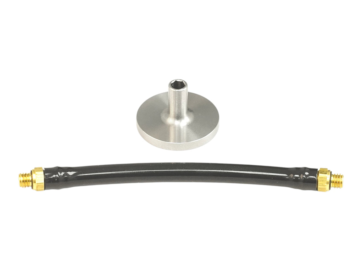 Wolverine hardpoint adapter for the MTW-308, a small silver fitting shown above the short black airline supplied with it