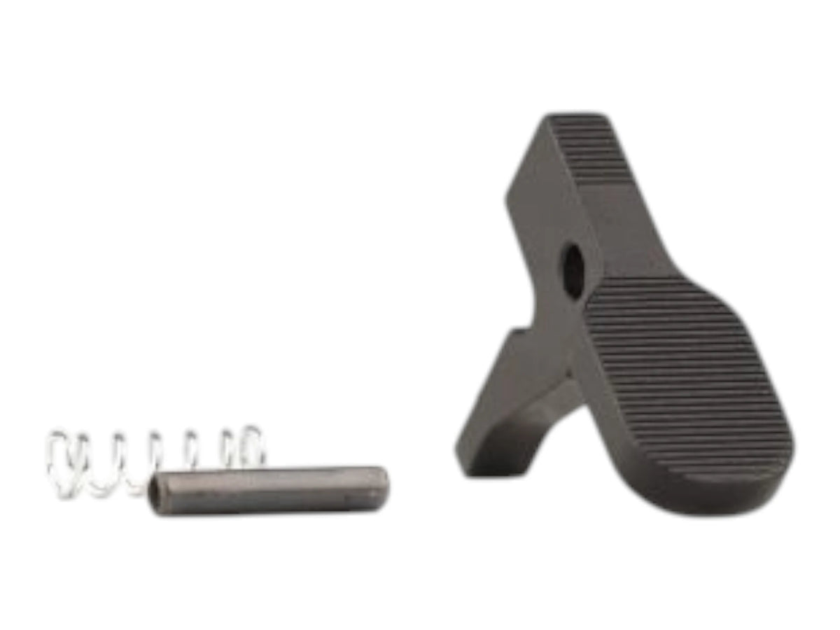 Wolverine MTW bolt catch with a ribbed thumb pad, shown beside its roll pin and detent spring
