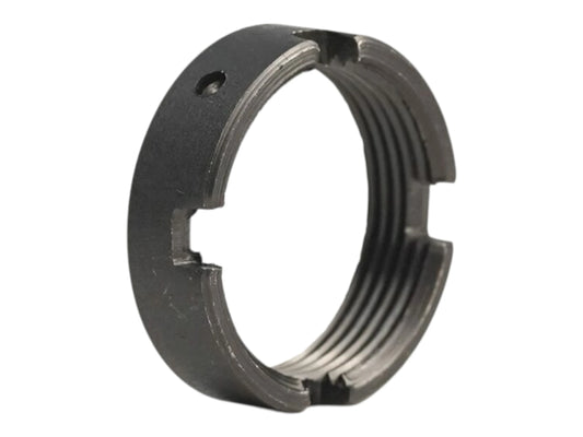 Wolverine MTW castle nut, a dark steel castellated ring with notched edges and internal threads
