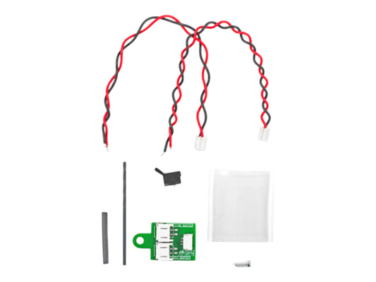 Wolverine universal wiring kit: four twisted red and black leads with connectors, a small board, clip and label